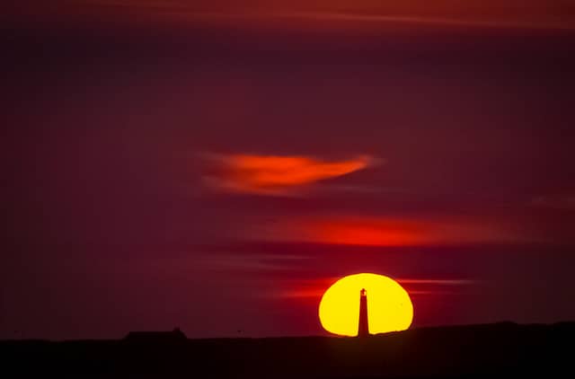Sylt - Sonne hinter Kampener Leuchtturm